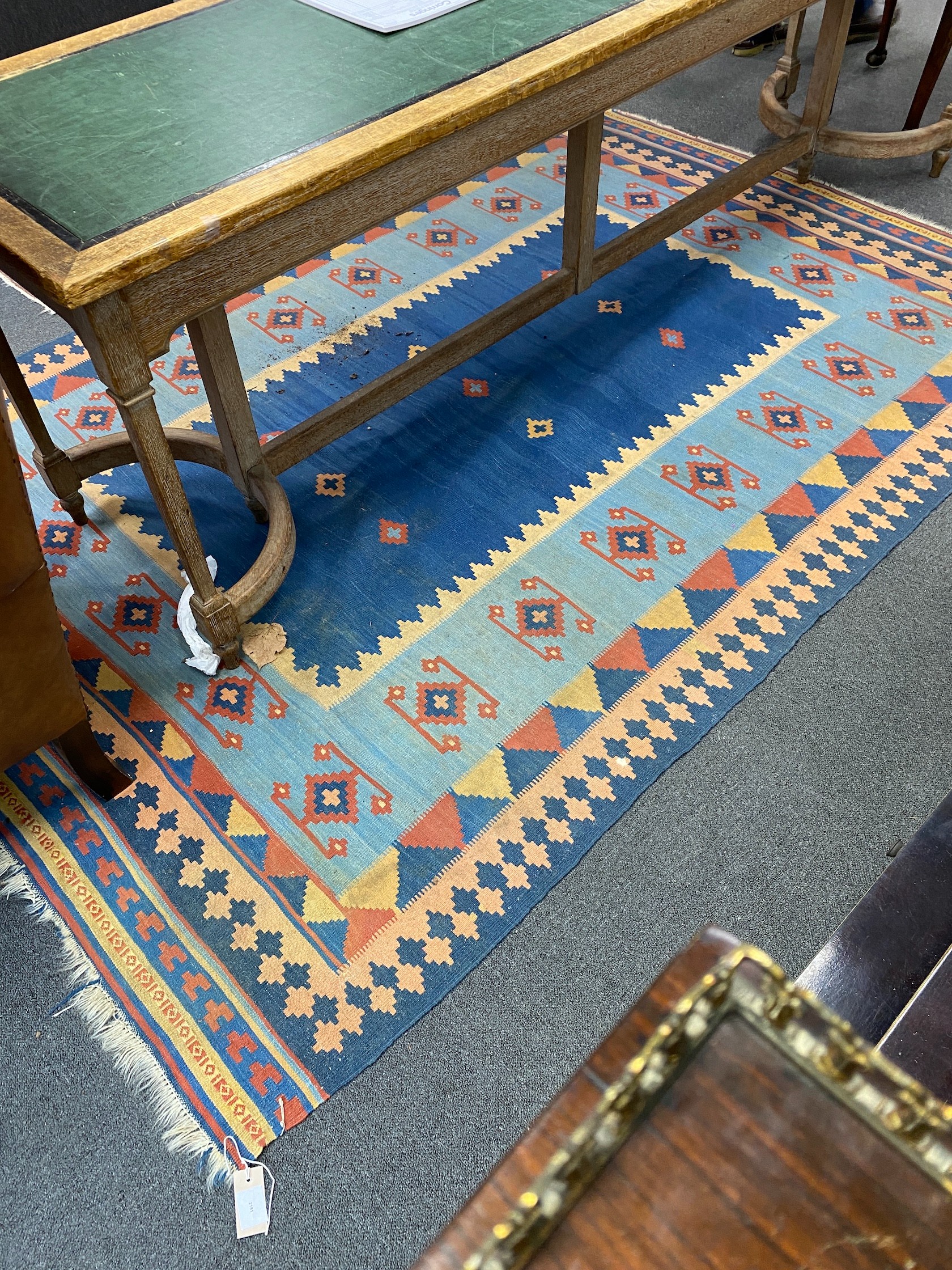 A Kilim polychrome flatweave rug, 260 x 178cm
